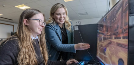 Teacher, Claire Litster, with a pupil from Dunoon Grammar School, working in an esports class.
